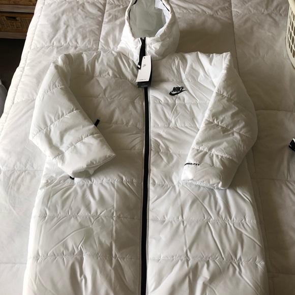 Nike Jackets & Blazers - Nike Classic Longline Padded Jacket with a hood in a size large! NWT!